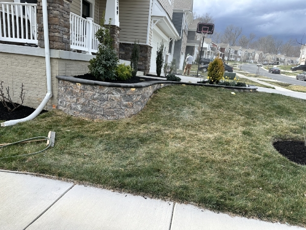Professional paver patio installation with elegant stone design creating a beautiful outdoor living space